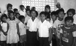 School children listening to our folk song.